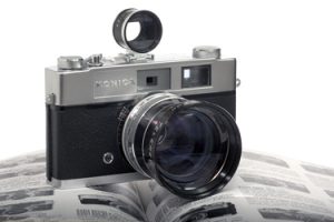 Photograph of a vintage Konica Auto S2 with Sun Telenet Attachment. Photographer Darron Barnes - Milly's Cameras Repair Materials